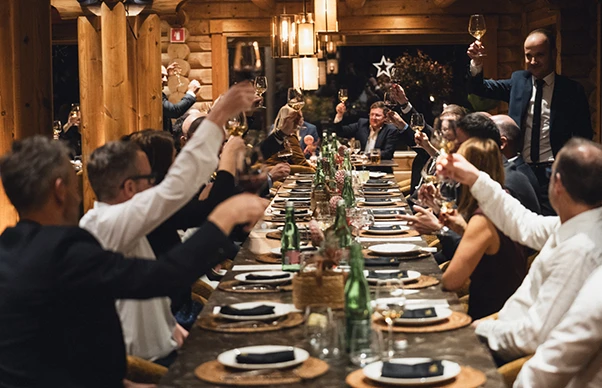 guests raise a toast at Novak M event dinner